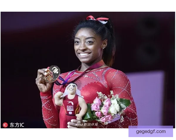 拜尔斯率美国团队 第四度摘体操女团金牌